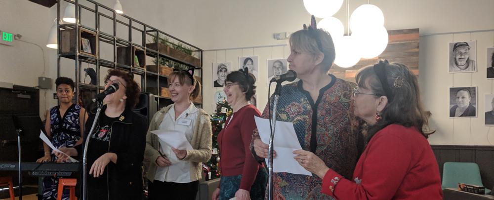 Community members singing together