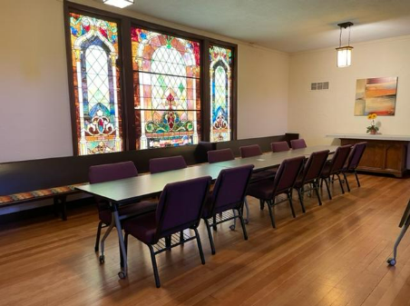 Long table with sained glass windows
